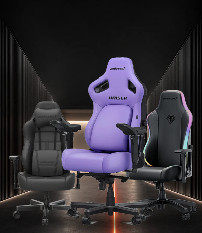 Three gaming chairs are displayed in a dark, modern studio setting. site wide 10% off -  The center chair is a lavender-purple racing style with 'KAISER 4' printed on the backrest.